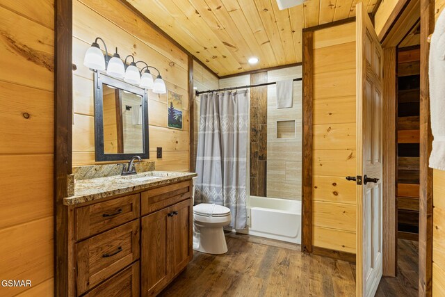 full bathroom with hardwood / wood-style floors, shower / bath combo with shower curtain, wood walls, and wood ceiling