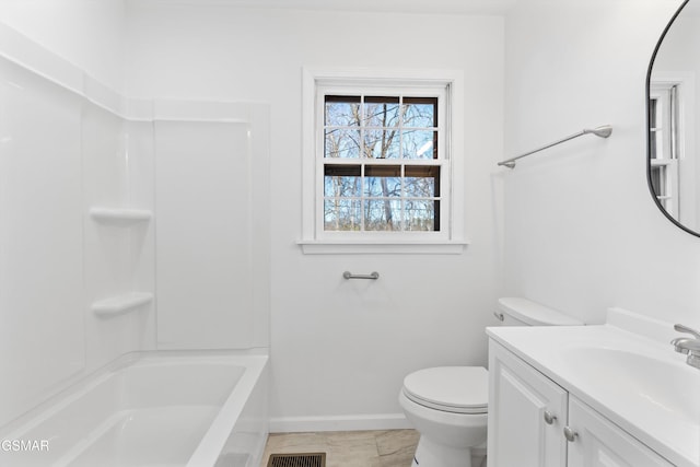 bathroom featuring shower / bathtub combination, toilet, visible vents, vanity, and baseboards