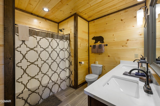 bathroom with a shower with shower curtain, wood ceiling, vanity, wooden walls, and toilet