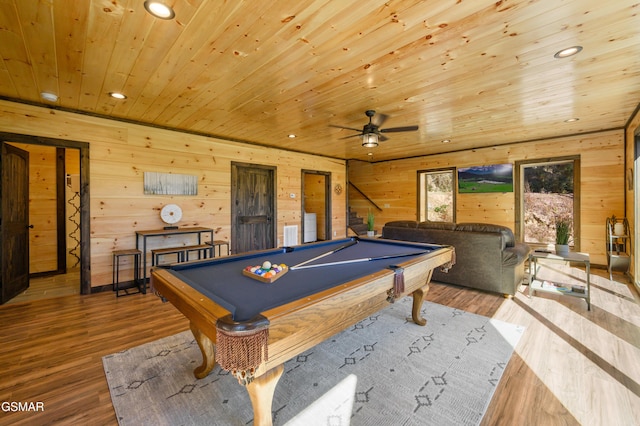 rec room with wood ceiling, wood walls, wood-type flooring, and pool table