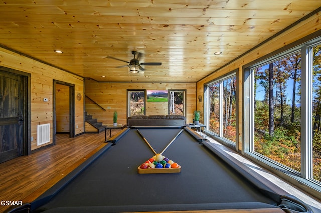 recreation room with ceiling fan, wood walls, wood ceiling, and pool table