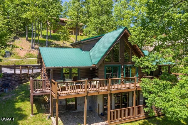 rear view of house with a deck