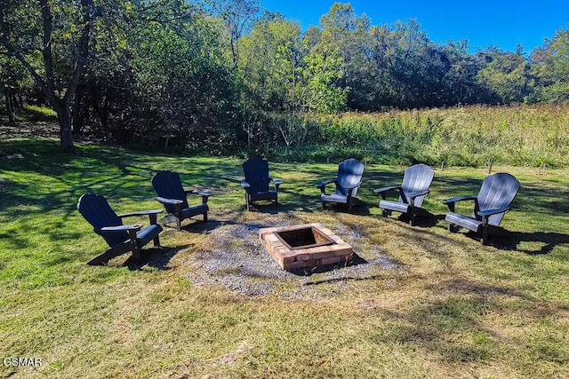 3149 Mutton Hollow Rd, Kodak, TN 37764 - view of grassy yard with a fire pit