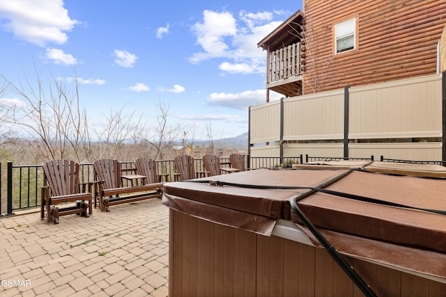 view of patio featuring a hot tub