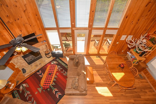 living room featuring ceiling fan and wood-type flooring