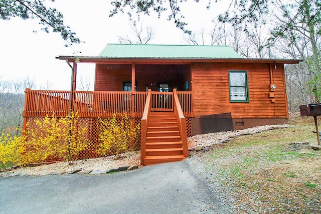 view of log cabin