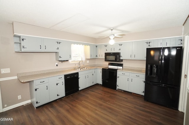 kitchen featuring white cabinets, black appliances, and sink