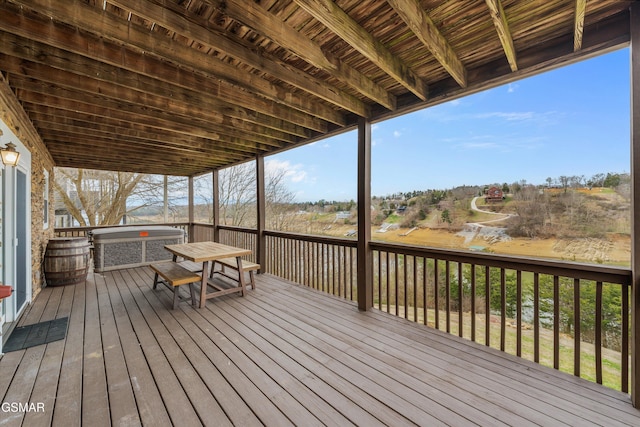 wooden deck featuring outdoor dining space