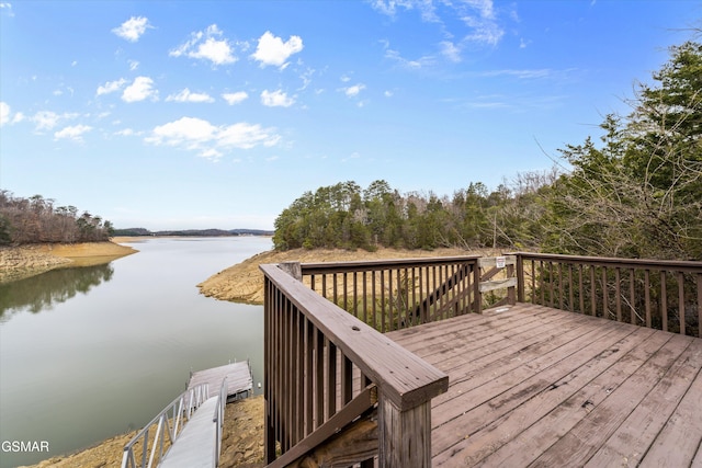 wooden terrace with a water view