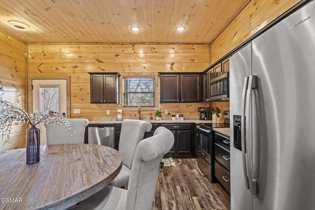 2125 Eagle Feather Dr, Sevierville, TN 37876 - kitchen featuring stainless steel appliances, dark wood-style flooring, wood ceiling, dark brown cabinetry, and recessed lighting