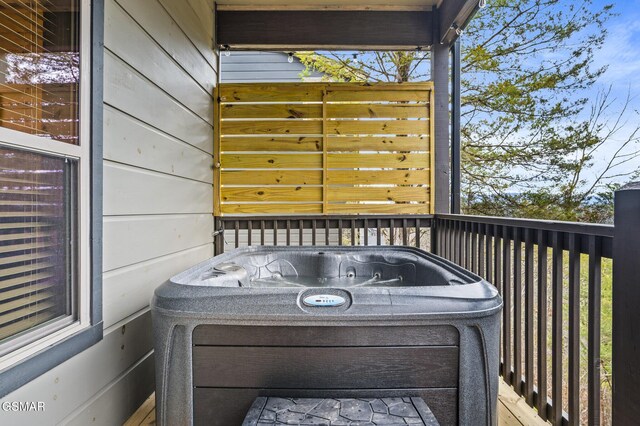 2125 Eagle Feather Dr, Sevierville, TN 37876 - deck with a hot tub
