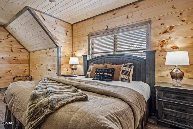 2125 Eagle Feather Dr, Sevierville, TN 37876 - bedroom featuring wood ceiling, wood walls, wood finished floors, and vaulted ceiling