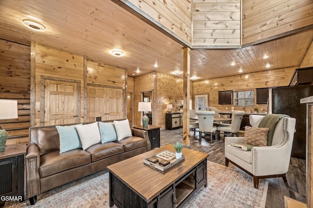 2125 Eagle Feather Dr, Sevierville, TN 37876 - living area featuring wood finished floors, wood walls, recessed lighting, and wooden ceiling