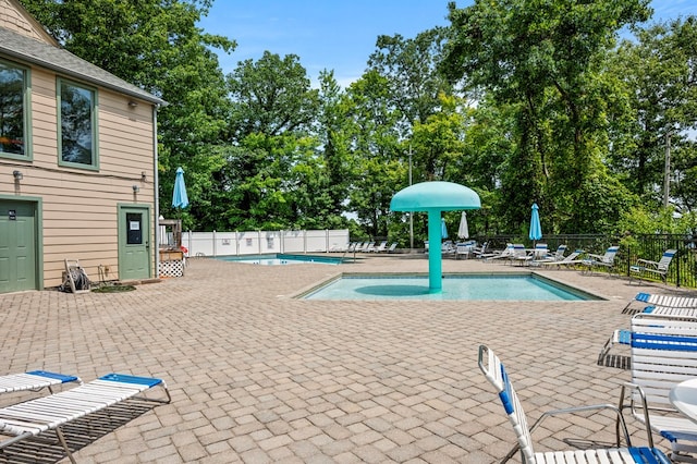 view of pool featuring a patio area