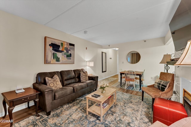 413 Baskins Creek Rd Unit 205, Gatlinburg, TN 37738 - living area featuring wood finished floors and baseboards