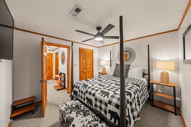 380 Laurel Rd, Townsend, TN 37882 - carpeted bedroom with crown molding, a ceiling fan, baseboards, and a textured ceiling