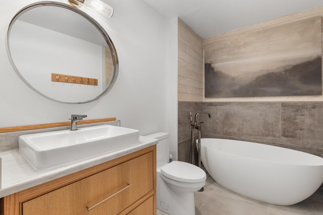 3661 Richardson Cove Rd, Sevierville, TN 37876 - bathroom with tile patterned floors, vanity, toilet, and a bathing tub