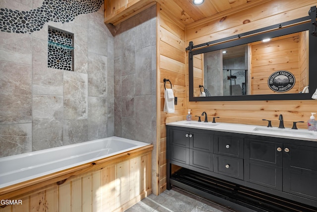 bathroom with a sink, wood walls, and double vanity