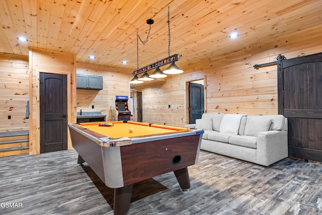 game room with a barn door, billiards, wood ceiling, and dark wood-style flooring