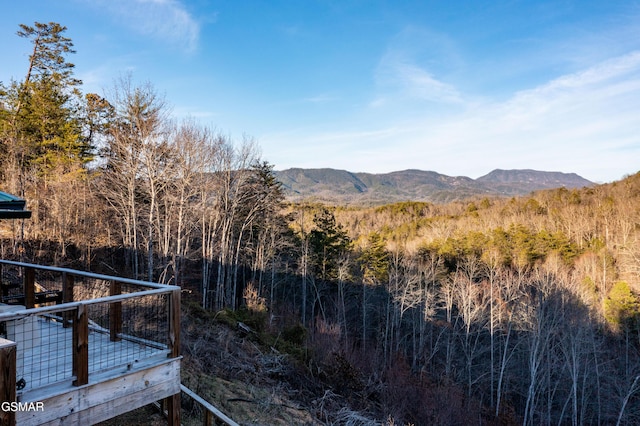 property view of mountains with a wooded view