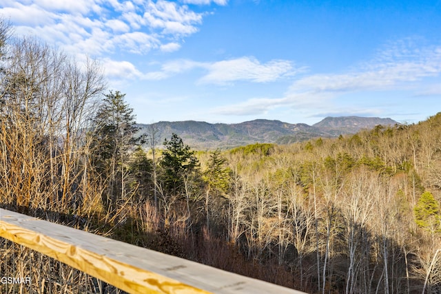 property view of mountains featuring a view of trees