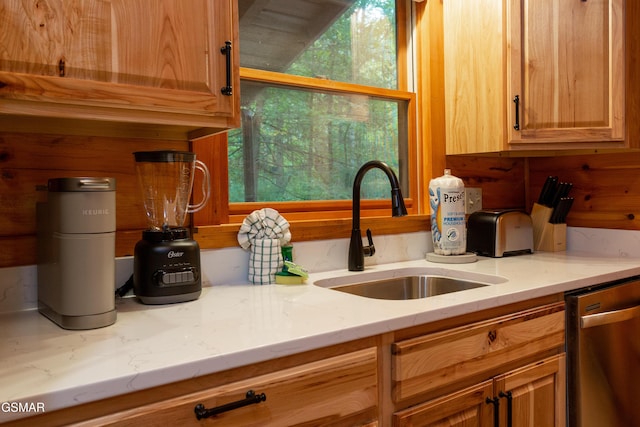 2069 Little Creek Way, Sevierville, TN 37862 - kitchen with dishwasher, a sink, and light stone counters