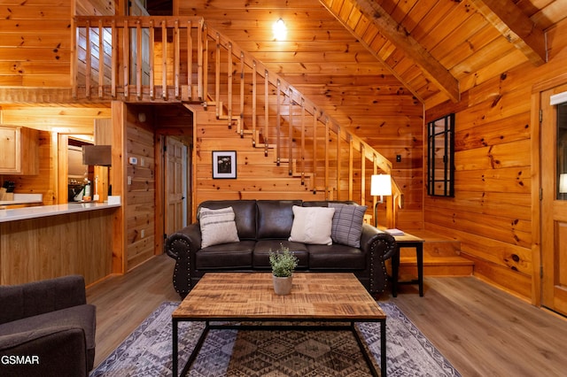 2069 Little Creek Way, Sevierville, TN 37862 - living room featuring wood walls, wood finished floors, stairway, and wood ceiling