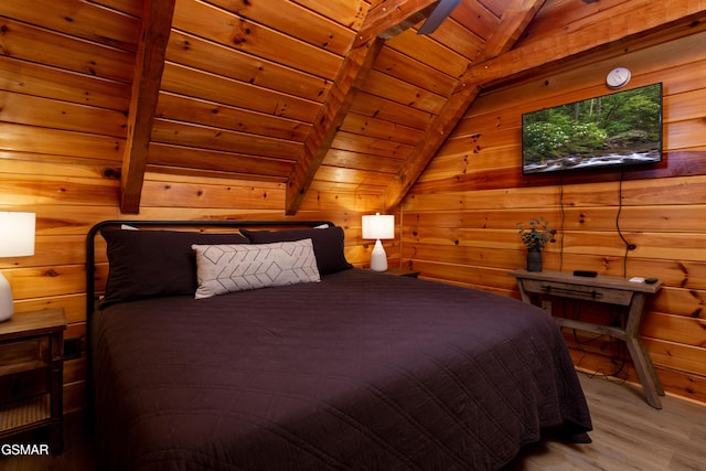 2069 Little Creek Way, Sevierville, TN 37862 - bedroom featuring wood ceiling, light wood-style floors, and wooden walls