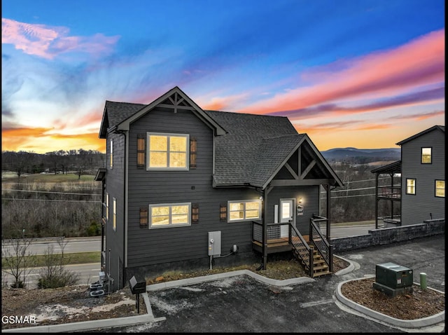 view of front of property with a mountain view