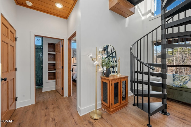2385 Forge Hideaway Loop Unit 4, Pigeon Forge, TN 37863 - entrance foyer featuring baseboards, light wood-type flooring, stairway, recessed lighting, and a towering ceiling