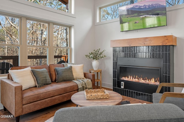 2385 Forge Hideaway Loop Unit 4, Pigeon Forge, TN 37863 - living room with a tile fireplace and wood finished floors