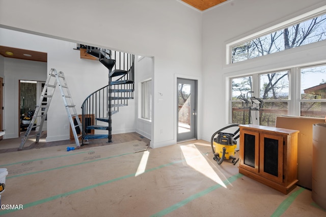 2385 Forge Hideaway Loop Unit 4, Pigeon Forge, TN 37863 - foyer featuring stairs and a high ceiling