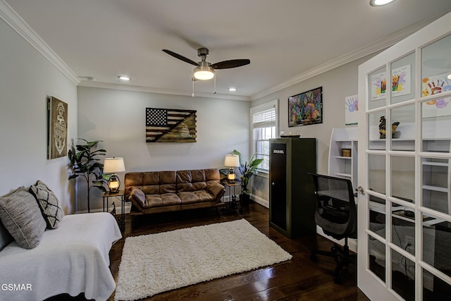 living area with dark wood finished floors, ceiling fan, recessed lighting, and ornamental molding