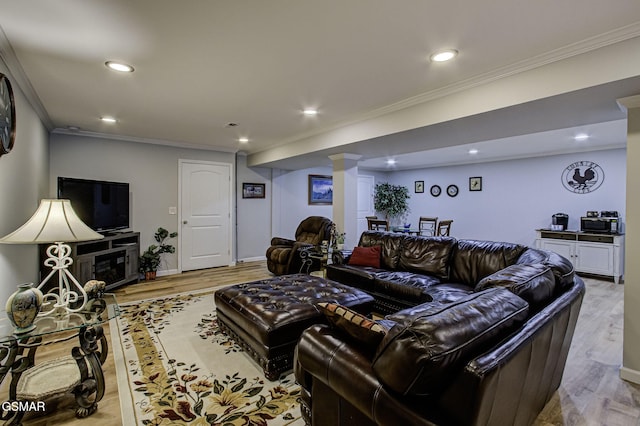 living room with crown molding, recessed lighting, and wood finished floors