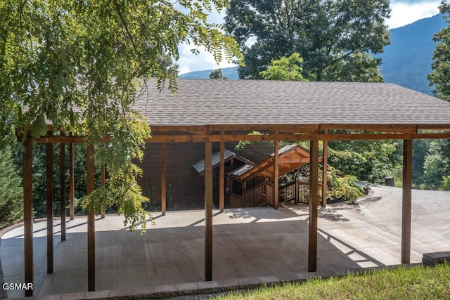 view of patio / terrace with a mountain view