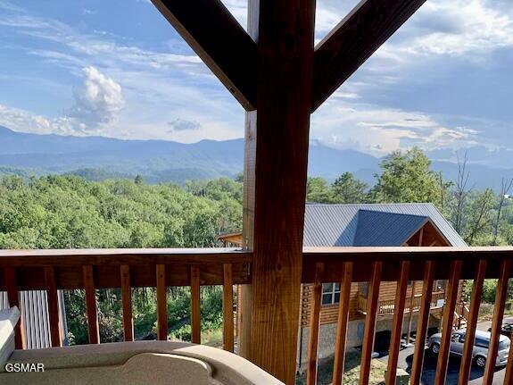 2022 Starr Crest Dr, Sevierville, TN 37876 - balcony featuring a forest view