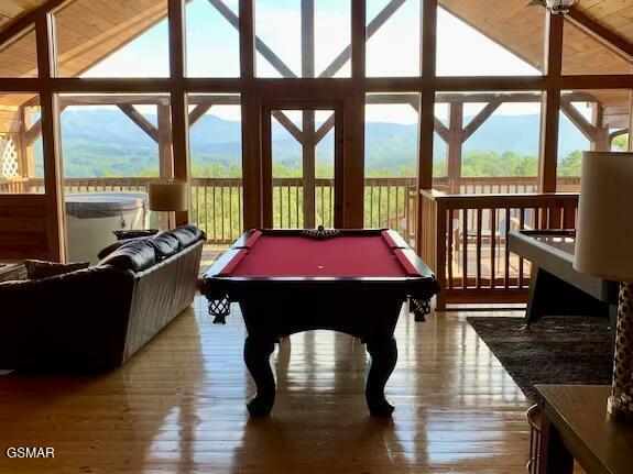 2022 Starr Crest Dr, Sevierville, TN 37876 - game room featuring lofted ceiling, billiards, hardwood / wood-style flooring, wooden ceiling, and a mountain view