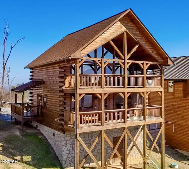 2022 Starr Crest Dr, Sevierville, TN 37876 - rear view of house with log exterior and a balcony