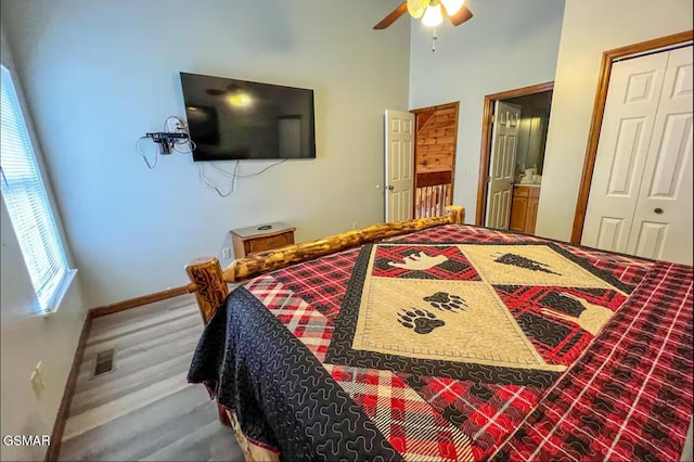 929 Smoky Ct, Gatlinburg, TN 37738 - bedroom with baseboards, a closet, a high ceiling, and a ceiling fan