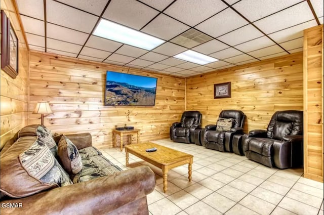 929 Smoky Ct, Gatlinburg, TN 37738 - cinema room with light tile patterned floors, wood walls, and a paneled ceiling