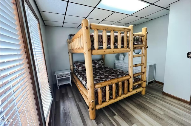 929 Smoky Ct, Gatlinburg, TN 37738 - bedroom with wood finished floors, baseboards, and a paneled ceiling