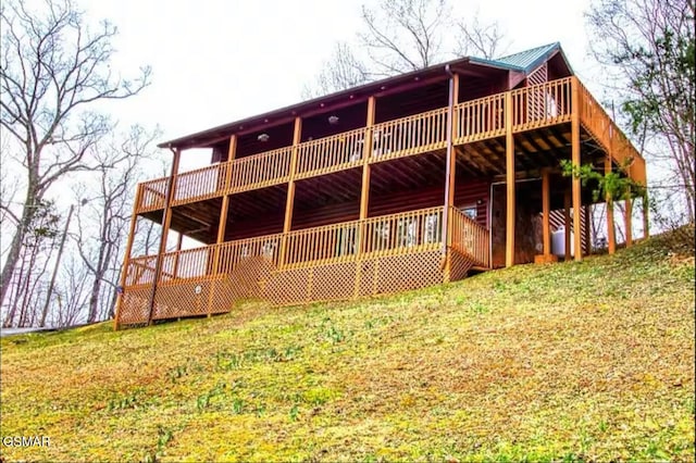 929 Smoky Ct, Gatlinburg, TN 37738 - back of house featuring a wooden deck and metal roof