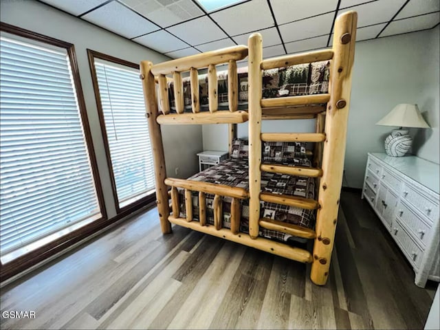 929 Smoky Ct, Gatlinburg, TN 37738 - bedroom featuring a paneled ceiling and wood finished floors