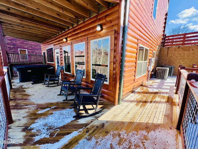 wooden deck with central AC unit