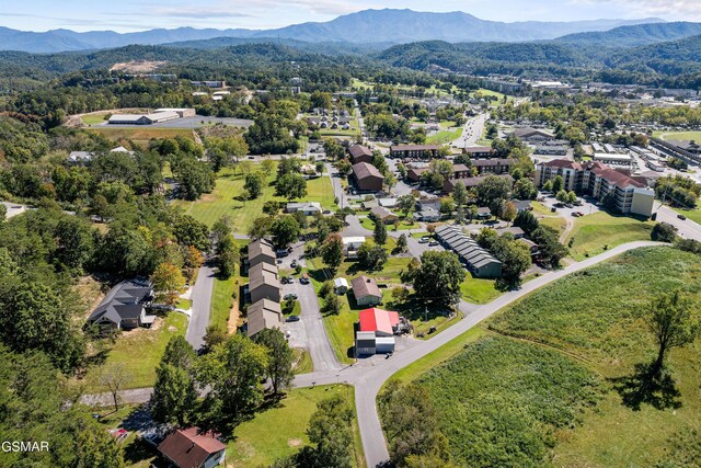 drone / aerial view featuring a mountain view