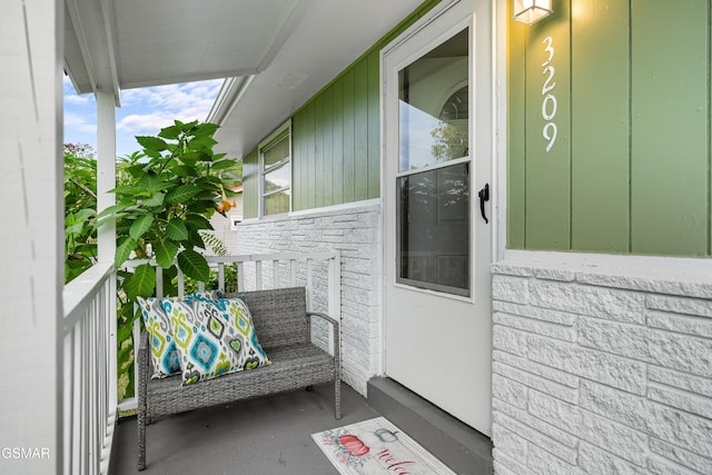 entrance to property with a porch