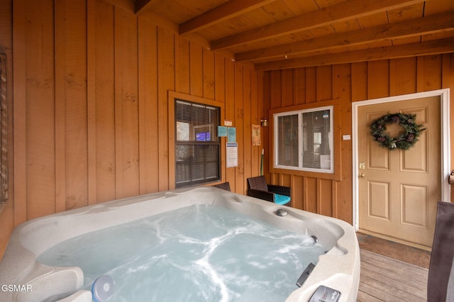 view of patio / terrace with a hot tub