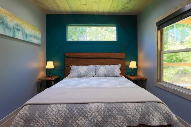 bedroom with wood ceiling