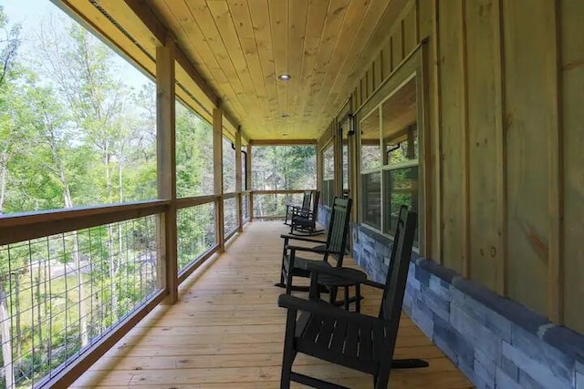 sunroom / solarium with wooden ceiling