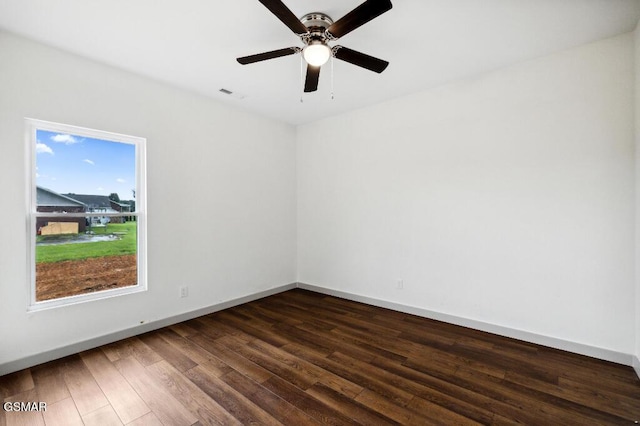 1902 Kaylee Dr, Jefferson City, TN 37760 - empty room with dark wood-type flooring, baseboards, and ceiling fan